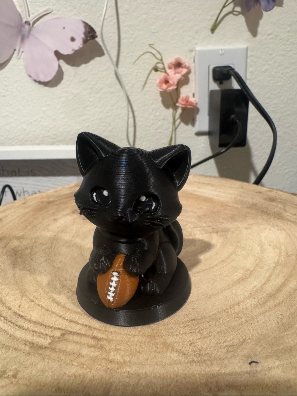 Black Cat Figurine Holding Brown Football - Home Accents